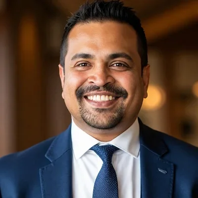 Headshot of Dinesh Kumar